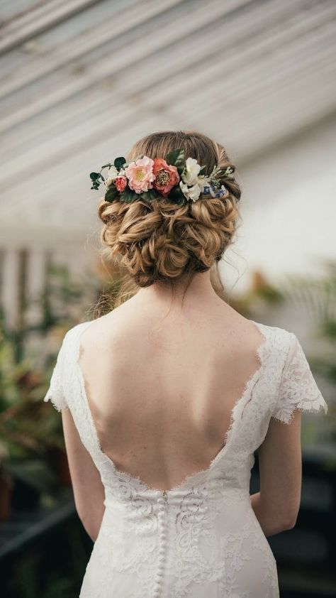 Wedding Updo With Flowers And Veil, Wedding Hair Updo Flowers, Floral Updo Wedding, Floral Bride Hair, Flower Comb Hairstyle, Bridal Hair With Flower Comb, Bride Flower Hairstyles, Wild Flower Hair Wedding, Bohemian Wedding Updo