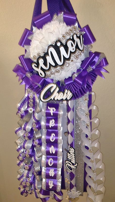 Purple Homecoming Mums Ideas, Purple White And Silver Homecoming Mums, Homecoming Mum Color Guard, Senior Mums Homecoming White And Purple, Purple And White Homecoming Mum, Purple And White Mums Homecoming, Purple Homecoming Mum, Purple Mums Homecoming, Homecoming Poster