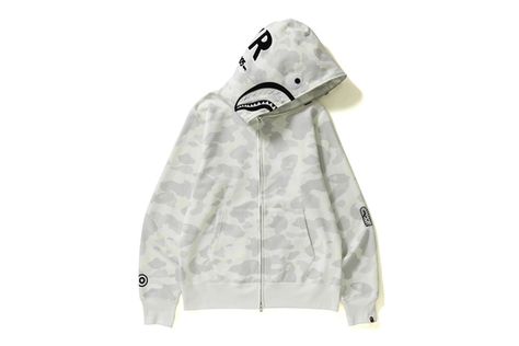 Please note: BAPE runs approximately one size small compared to traditional US sizing. We recommend moving up at least one whole size when purchasing a BAPE piece of clothing. | BAPE City Camo Shark Full Zip Hoodie in White/Black White Bape Hoodie, Grey Bape Hoodie, Bape Shark Hoodie, Bape Jacket, Underground Clothing, Bape Shark, Bape Hoodie, Shark Hoodie, Hip Hop Sweatshirts