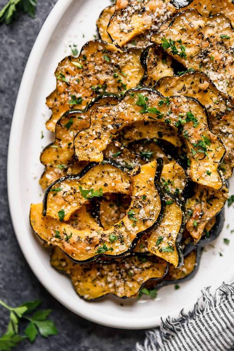 This Roasted Acorn Squash Recipe is unlike any other side dish you'll find. We think it's the best (and easiest) way to prepare acorn squash for your dinner table, holiday menu, and fun foodie gatherings. Made with fresh herbs, Parmesan cheese, and melted butter. Parmesan Roasted Acorn Squash, Parmesan Herb Roasted Acorn Squash, Acorn Squash Baked Healthy, Squash Thanksgiving Sides, Parmesan Roasted Squash, Acorn Squash Sweet Potato, Stuffing Acorn Squash, Baking Acorn Squash In Oven, Acorn Squash Dishes