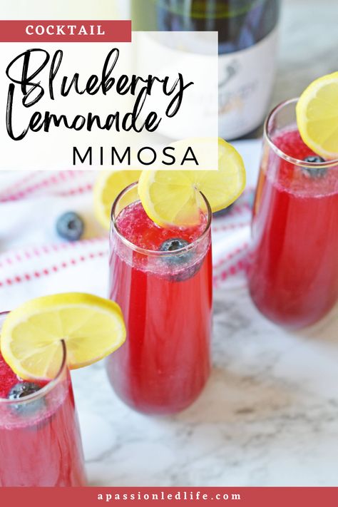 Blueberry Lemonade Mimosa is made with frozen blueberries, lemonade, and sparkling wine. It's the perfect cocktail for spring and summer brunches Blueberry Lavender Mimosa, Blackberry Mimosa Recipe, Mimosa By The Pitcher, Mimosa Recipe With Prosecco, The Best Mimosa Recipe, Lemon Blueberry Mimosa, Blueberry Wine Cocktail, Fun Mimosa Recipe, Lemosa Recipe