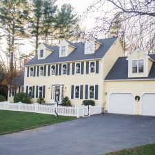 Updating the Exterior of Our Home Gray Colonial House, Gray Colonial House Exterior, Yellow Colonial House Exterior, Colonial House Exterior, Warm Cozy Christmas, New England Colonial, Colonial House Exteriors, Best Neutral Paint Colors, New England Farmhouse