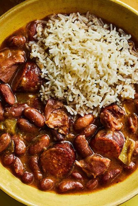 This red Beans and rice recipe from Kwame Onwuachi's book, My America, is his ideal version of the classic Southern dish. It's based on his mom's rendition and starts with the Cajun and Creole trinity of celery, onion, and bell pepper. Red Beans And Cornbread, Red Beans And Rice Meal Ideas, Red Peas And Rice Recipe, Southern Style Red Beans And Rice, Authentic Louisiana Red Beans And Rice Recipe, Red Beans And Rice With Ground Beef, Mild Red Beans And Rice Recipe, Sides For Red Beans And Rice, Red Beans And Rice Recipe Cajun