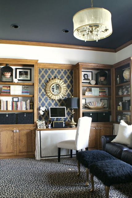 Good use of paint with oak trim. {Martha Stewart Wrought Iron}  Notice all the white accents. Skirted Desk, Organized Shelves, Dark Bookshelves, Downstairs Ideas, Honey Oak Trim, Bookcase Ideas, Dimples And Tangles, Honey Oak Cabinets, 90s Home