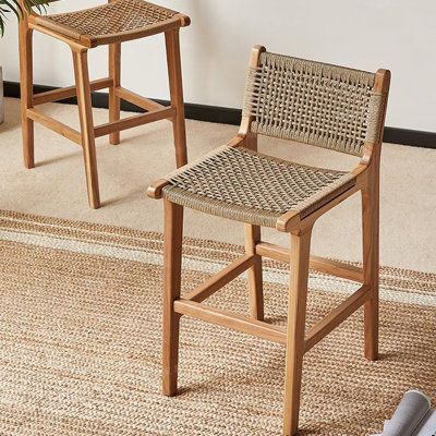 Embrace the charm of vintage elegance with our unique rattan stool. Crafted with a solid wood frame and hand-woven cowhide paper rope seat, it offers both durability and comfort. The ergonomically designed backrest ensures a cozy seating experience, while the eco-friendly paint finish keeps your space healthy and odour-free. A must-have for your home! | Bungalow Rose Solid Wood Tall Stool Brown 35.04 x 15.75 x 18.5 in | C110722673_661449422 | Wayfair Canada Bar Booth, Booth Seat, City Cottage, Tall Stools, Rattan Stool, Brown Bar Stools, Mom Kitchen, High Bar Stools, Wood Counter Stools