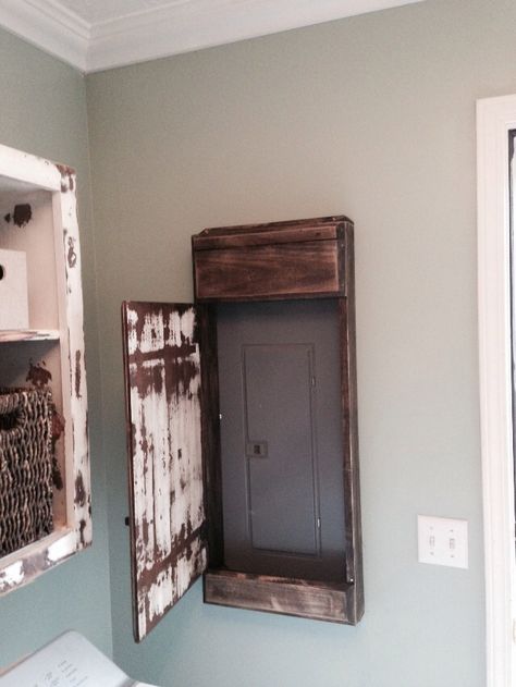 My hubby made this sweet distressed door cover for the electrical panel in our laundry room. Primitive Laundry Rooms, Basement Laundry Room, Electrical Panel, Door Cover, Baby Shower Decor, Old Door, Laundry Room Makeover, Room Remodeling, Basement Ideas