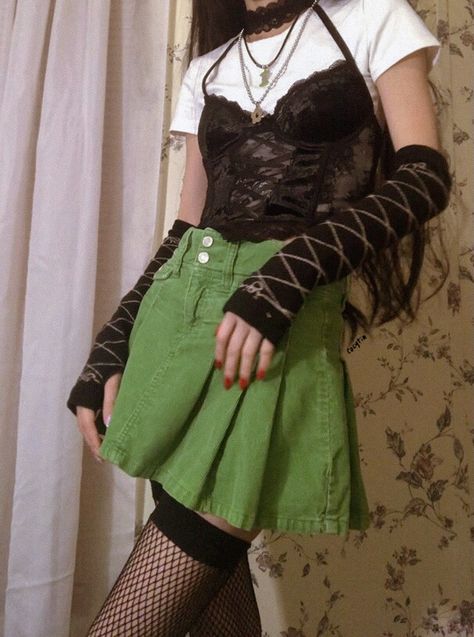 Green skirt, corset, platform boots, fishnet, outfit, fashion, arm warmer, arm sleeves, corduroy skirt Green Alternative Outfit, Green Punk Outfits, Green Day Concert Outfit, Green Emo Aesthetic Outfit, Y2k Green Skirt, Black And Green Outfit, Emo Aesthetic Outfit, Green And Purple Outfit, Green Plaid Skirt Outfit Grunge