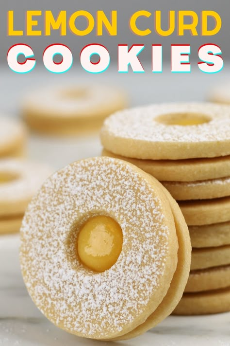 These lemon curd cookies are delicious lemon snacks for citrus lovers. You can make these lemon cookies with homemade or store-bought lemon curd, and you probably have most of the other ingredients on hand. If you like soft and lemony shortbread cookies, you must try this recipe. #cookies #lemoncookies #lemoncurdcookies #shortbreadcookies Lemon Linzer Cookies, Lemon Curd Shortbread Cookies, Recipes With Lemon Curd, Lemon Snacks, Lemon Curd Shortbread, Cookies With Lemon Curd, Lemon Curd Cookies Recipe, Citrus Cookies, Best Shortbread Cookie Recipe