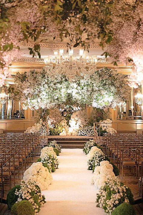 This classy aisle look feels ideal to fit any ceremony. Stash this idea on your aisle ideas.#ceremonyinspo #bridalinspiration #brideinspo #bridalevent. Aisle Lined With Flowers, Wedding Aisle Ideas, Flowers Lining Aisle, White Floral Aisle Decor, Wedding Ceremony Aisle Decor, Ceremony Aisle Decor, White Flowers Lining Aisle, White Floral Ceremony Aisle, Ethereal Wedding