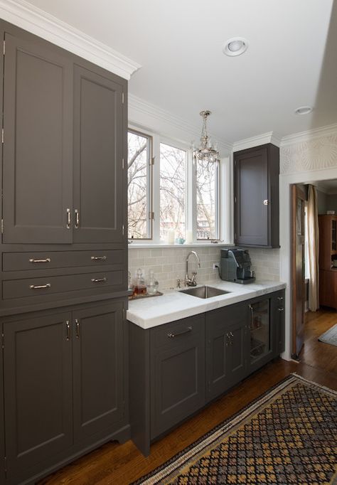 Dark Taupe Cabinets Black Countertops Taupe Cabinets, Taupe Cabinet Black Countertop, Black Countertops With Taupe Cabinets, Gray Cabinet Black Countertop, Charcoal Cabinets Wet Bar, Taupe Kitchen Cabinets, Taupe Bathroom, Gray Subway Tile Backsplash, Glass Kitchen Cabinet Doors