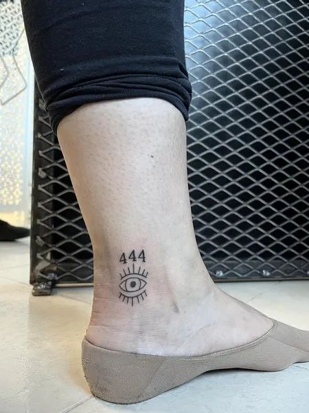 Angel Number Tattoo Carry Special Meaning? [100+ Small Tattoo Ideas] Just When it comes to tattoo designs, some people go for the classic images while others want something with a deeper meaning. If you’re the latter, you may be interested in getting an angel number tattoo. 444 Tattoo Ankle, 444 Tattoos, 444 Tattoo Ideas, Tattoo On Ankle, Angel Number Tattoo, 444 Tattoo, Tattoo Spots, Number Tattoo, L Tattoo