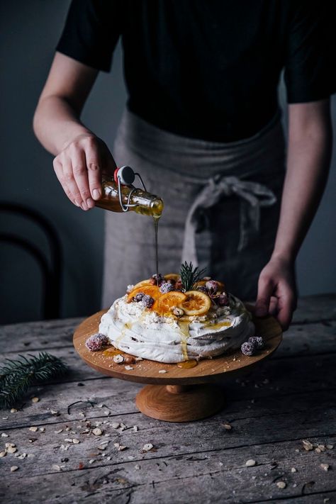 Christmas Pavlova with sugared Cranberries and Orange & Citron Slices - Our Food Stories Christmas Food Photography, Christmas Pavlova, Dark Food Photography, Pavlova Recipe, Sugared Cranberries, Beautiful Food Photography, Food Photography Inspiration, Pavlova, Beautiful Food