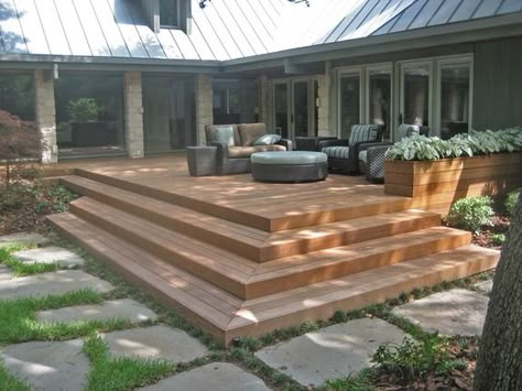 Shop www.mccoys.com for lumber, stain and other decking materials to expand your outdoor space. #mccoys #decks Medium Deck Ideas, Front Porch Built In Bench, Decking Front Of House, Alternatives To Deck Railing, Corner Steps, One Step Deck, Backyard Two Level Deck Ideas, Raised Backyard Deck Ideas, Deck To Yard Transition