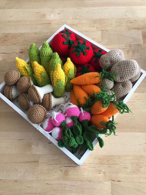 Handmade crochet vegetables perfect for tiered tray decor , party decor , kitchen decor and kitchen play set for your kids. All vegetables approximately 2,5-3 inches They are ready to dispatch from Florida If you choose to purchase a set you will have one tomato , one potato, one radish, one carrot, one mushroom and a corn For our other crochet accessories, please visit www.etsy.com/shop/CuteAlley?ref=shop_sugg For our other crochet blankets, please visit www.etsy.com/shop/CuteAlley?ref=shop_sug Crochet Vegetable Garden, Crochet For Gardeners, Vegetable Crochet Pattern, Crochet Food Set, Crochet Play Kitchen, Crochet Kitchen Accessories, Kids Crochet Toys, Crochet Toy Food, Crochet Play Sets