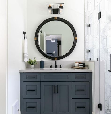 Waterside Retreats | 2023 | HGTV Gray Black Bathroom, Contemporary Coastal Bathroom, Dark Gray Vanity, Bathroom Rich, White Coastal Bedroom, Coastal Family Rooms, Dark Gray Bathroom, Blue Bathroom Vanity, Record Room