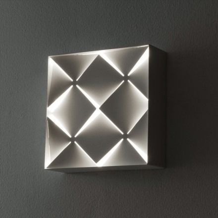 A white faceted metal housing creates incredible shadow patterns for a functional optical illusion! Alabaster White, Led Flood Lights, Energy Efficient Lighting, Fluorescent Light, Led Flush Mount, Metal Homes, Light Sconces, White Metal, 7 H