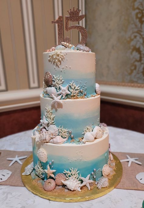 Ocean Wedding Cake Ideas, Sea Theme Quinceanera Ideas, Sea Themed Quinceanera, Wedding Cake Sea Theme, Costal Theme Birthday Party, Under The Sea Sweet 16 Cake, Quinceanera Beach Theme, Coastal Wedding Cake Ideas, Ocean Sweet 16 Ideas