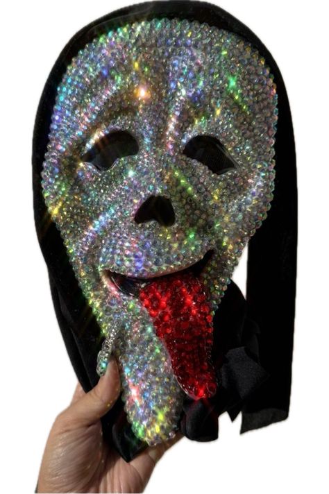 ♥ Often imitated never duplicated Ghost face mask covered in Swarovski element crystals. We DO NOT use cheap dull craft store crystals. ♥ ALL Masks will now come with fully blinged mouths +Nose in black crystals  ♥These Masks are the original Ghostface Masks with the hood attached, this is NOT the style without the hood that you have to hold on your face. ♥ Available in iridescent, clear crystal, light pink, hot pink, bloody. ALL ITEMS ARE FINAL SALE We do not accept cancellations after (1) hour Ghost Face Wassup, Ghostface Masks, Ghostface Mask, Store Crystals, Photoshoot Diy, Vendetta Mask, Ghost Face Mask, Scream Mask, Matching Hoodies For Couples