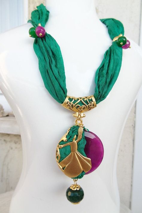 Excited to share the latest addition to my #etsy shop: Gold Whirling Dervish Necklace, Semazen Necklace, Turkish Green Silk Necklace, Gold Frame Semazen, Turkish Jewelry, Sufi, Mother Turkey Jewelry, Whirling Dervish, Turkey Style, Silk Necklace, Flower Statement Necklace, Turkish Jewelry, Trendy Flowers, Floral Jewellery, Crystal Flower