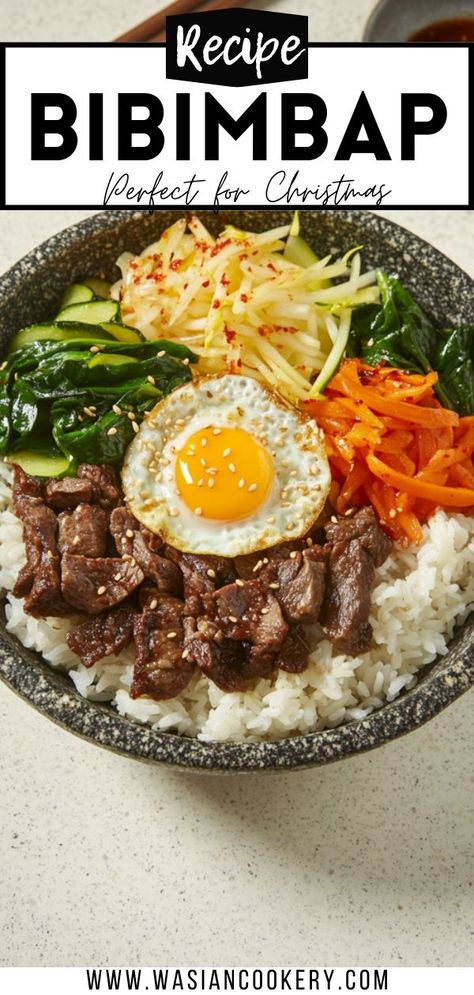 A vibrant Bibimbap bowl featuring fresh vegetables, seasoned beef, a fried egg, and a drizzle of sauce, ideal for a healthy and easy Korean-inspired meal. Korean Bbq Bowls, Bibimpab Korean, Bim Bim Bap Recipe, Korean Bowl Recipe, Bibimbap Recipe Easy, Korean Bowls, Korean Noodle Recipes, Healthy Korean Recipes, Korean Bowl