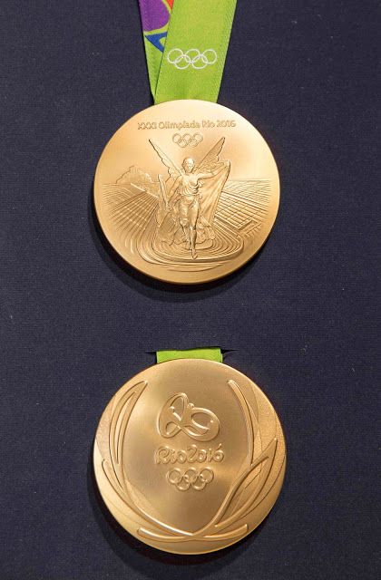 The reverse (top) and obverse of Rio 2016 Olympics gold medal. Photo credit: Rio 2016/Alex Ferro. Gymnastics Medals, Football Medals, Medal Design, Olympics Activities, Olympic Logo, Gold Inspiration, Champions Trophy, Summer Olympic Games, Trophy Design