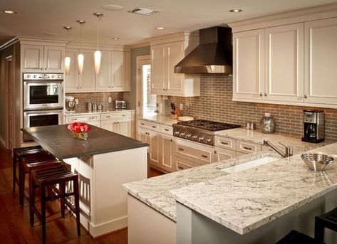 This kitchen has some unique aspects going on with the granite because the island is entirely different from the rest. That gray though really seems to emphasize the gray colors in the rest of the Bianco Romano granite. Slate Kitchen Countertops, Slate Kitchen, White Kitchen Traditional, Slate Countertop, Kitchen Island Tops, White Granite Countertops, Outdoor Kitchen Countertops, Kitchen Countertop Materials, Countertop Design