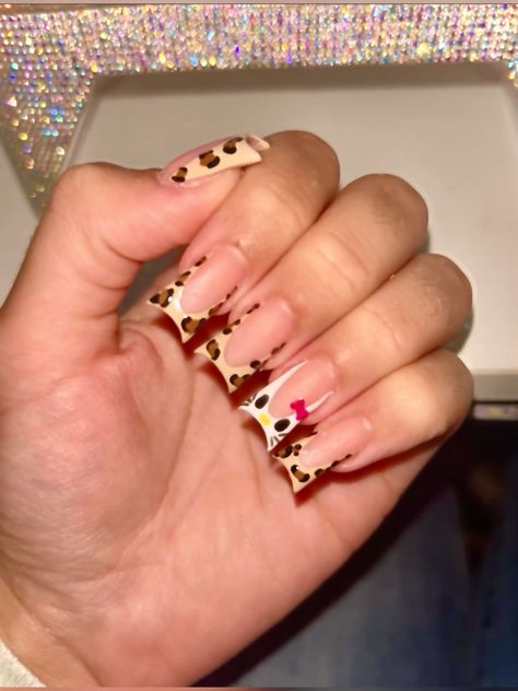 Stylish Nails French Tips, French Tip Cheetah Print Nails, Cheetah Print French Nails, French Tip Nails Cheetah, Hello Kitty Cheetah Print Nails, Cheetah Hello Kitty Nails, Cheetah Print Nail Ideas, French Tip Cheetah Nails, French Tip Nails Hello Kitty