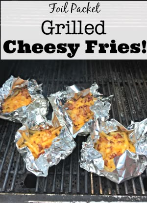 Foil packet grilled cheesy fries- a dish that your kids can pull easily pull together, cooks right on the grill, and has no virtually no clean up! Yes- please! Fries On The Grill, Foil Packet Potatoes, Foil Meals, Cheesy Fries, Foil Pack Dinners, Foil Packet Dinners, Foil Pack Meals, Foil Dinners, Foil Packs