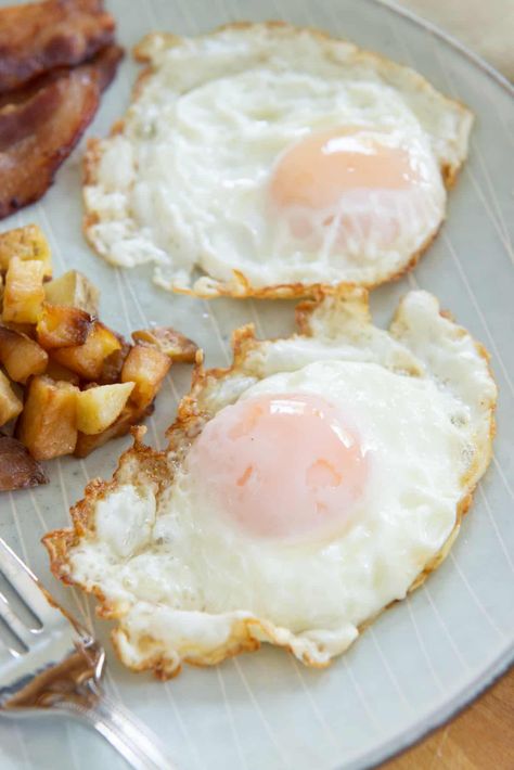 Basted Eggs (Perfect Runny Yolk + Crispy Edge) - Fifteen Spatulas Basted Eggs, Egg Yolk Recipes, Peeling Hard Boiled Eggs, Runny Eggs, Eggs Breakfast, Cooking Bacon, Potato Sides, Sweet Potato Hash, Egg Dish