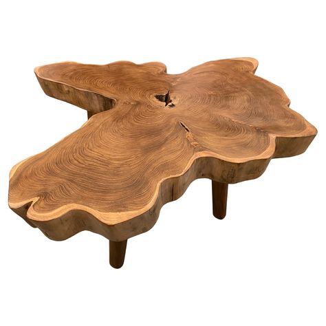 Impressive three inch single slab live edge teak wood coffee table. This beautiful butterfly shape is set on mid century style legs. Finished with a natural oil revealing the beautiful wood grain. We have a collection. The price and images reflect the one shown. Own an Andrianna Shamaris original. Andrianna Shamaris. The Leader In Modern Organic Design. Raw Wood Coffee Table, Teak Wood Coffee Table, Southwest Modern, Log Coffee Table, Modern Cocktail Tables, Modern Organic Design, Lucite Coffee Tables, Midcentury Style, Organic Modern Decor Living Room