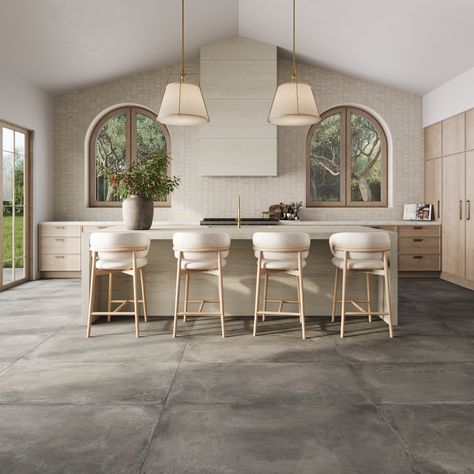 Discover the Ramsey collection, a clean and simple concrete look porcelain tile designed for the industrial minimalist. Available in large format and 2cm sizes, this product creates the same style as poured concrete with the ability to achieve a seamless indoor and outdoor transition. Not only does this look and feel like the material it mimics, but it's also a more eco-friendly alternative as our tile doesn't emit carbon dioxide during production. From the garden to the swimming pool, from stai Large Concrete Tile Floor, Big Tile Kitchen Floor, Concrete Floor In Kitchen, Concrete Floors In Kitchen, Neutral Porcelain Tile Floors, Floor Concrete Kitchen Island, Kitchen With Concrete Floors, Concrete Floors Kitchen, Large Neutral Floor Tile