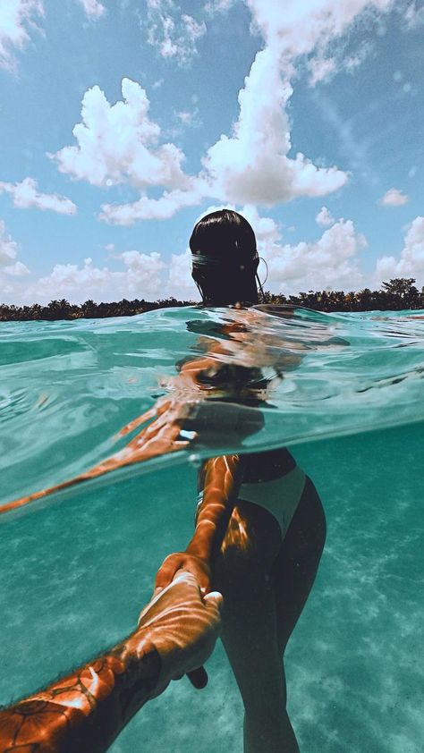 A girl with dark hair leads the photographer into the waters of Cocalitos Cenote in Bacalar, Quintana Roo, Mexico. Tropical trees line the horizon and the sky is blue. She wears a white bikini. Couple In Mexico Aesthetic, Couples In Mexico, Cute Mexico Pictures, Cancun Mexico Picture Ideas, Mexico Vacation Pictures, Mexico Baecation, Mexico Vacation Aesthetic, Cancun Mexico Pictures, Tulum Mexico Aesthetic