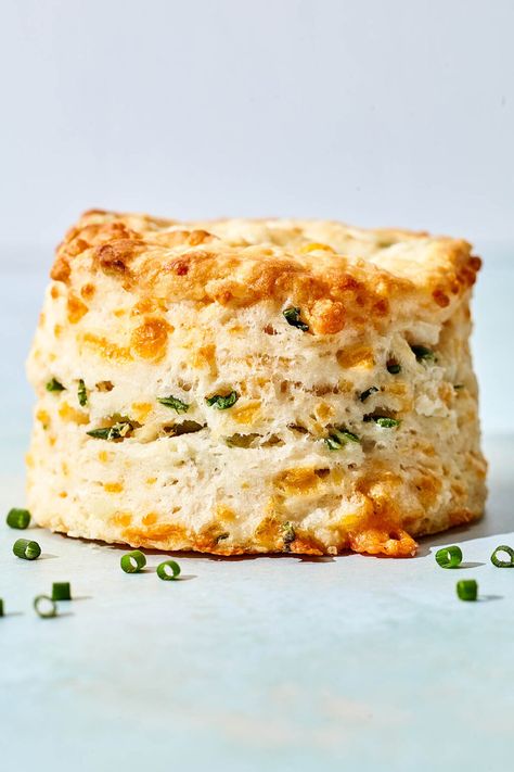 Learn how to make THE BEST cheddar chive biscuits—crispy outside, tender inside, and loaded with cheesy goodness and fresh garden chives. Cheddar And Chive Biscuits, Litha Recipes, Pork Tenderloin Side Dishes, Cheddar Chive Scones, Pork Tenderloin Sides, Cheddar Chive Biscuits, Molasses Baked Beans, Chive Biscuits, Cherry Clafoutis