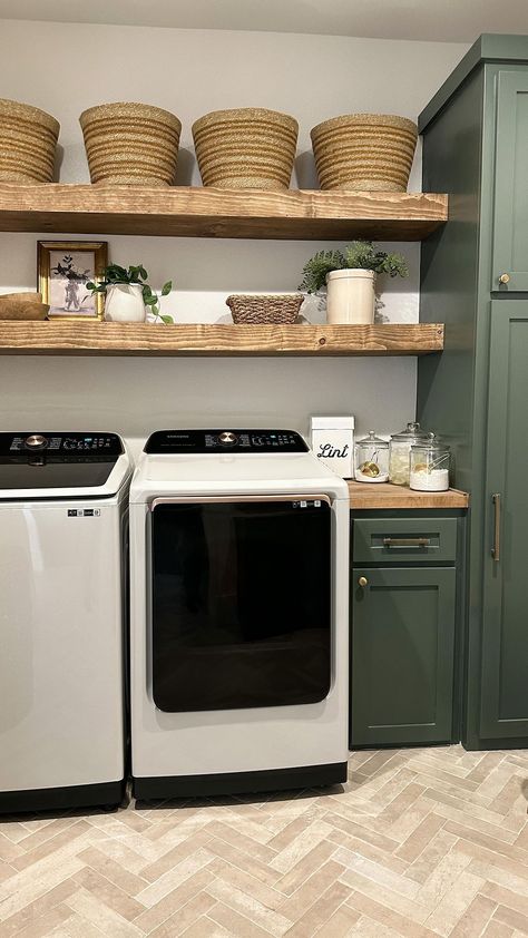 Sage Green And Black Laundry Room, Earth Tone Laundry Room, Sage Green Laundry Room Cabinets, Open Laundry Room Ideas, L Shape Laundry Room Layout, Aesthetic Laundry Room, Farmhouse Dinnerware Sets, Cottage Laundry Room, Laundy Room