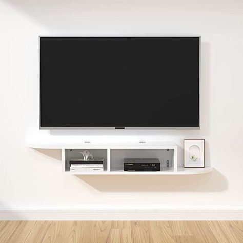 Hanging Tv Console, Hanging Tv In Bedroom, Wall Mounted Tv Ideas Video Games, Floating Shelf For Video Game Console, Tv On Wall, Tv Floating Shelves Ideas Tv Walls, Wall Mounted Tv And Games Console, Gaming Console Wall Mount, Wall Mounted Tv Playstation