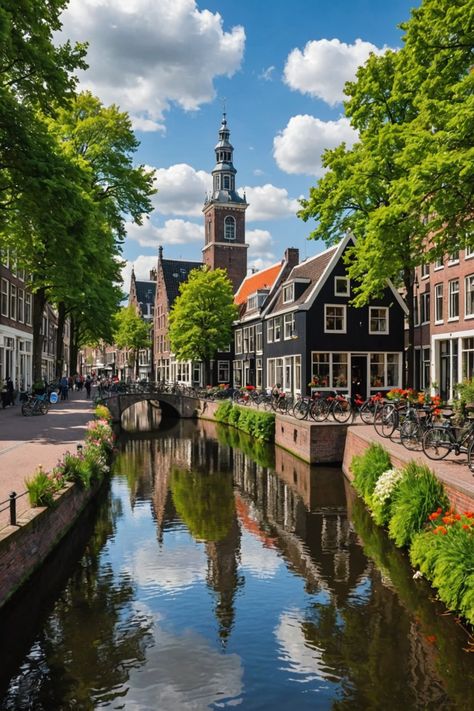 10 Must-Visit Places in the Netherlands for an Unforgettable Trip! Netherlands Beautiful Places, Beautiful European Cities, Canals Of Amsterdam, Tulips In Netherlands, Delft Netherlands Aesthetic, Netherland Architecture, Amsterdam Countryside, Harlem Netherlands, Tulip Amsterdam