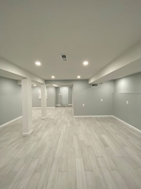 Modern Basement Living Room Ideas, Basement Apartment Renovation, Hardwood Floor Basement, Basement With Gray Flooring, Gray Floor Basement Ideas, Finished Basement Flooring Ideas, Basement Paint Ideas Color Schemes, Small Basement Paint Colors, Finished Basement Colors Schemes