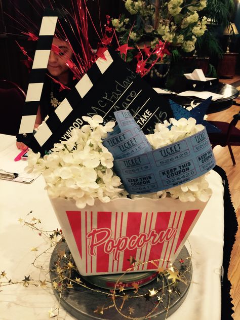 Movie Centerpiece Hollywood Table Centerpieces Diy, Hollywood Red Carpet Centerpiece, Movie Party Table Decor, Movie Theater Centerpieces, Movie Centerpieces Wedding, Movie Night Centerpieces, Movie Theme Centerpiece Ideas, Movie Themed Table Centerpieces, Movie Night Centerpiece Ideas