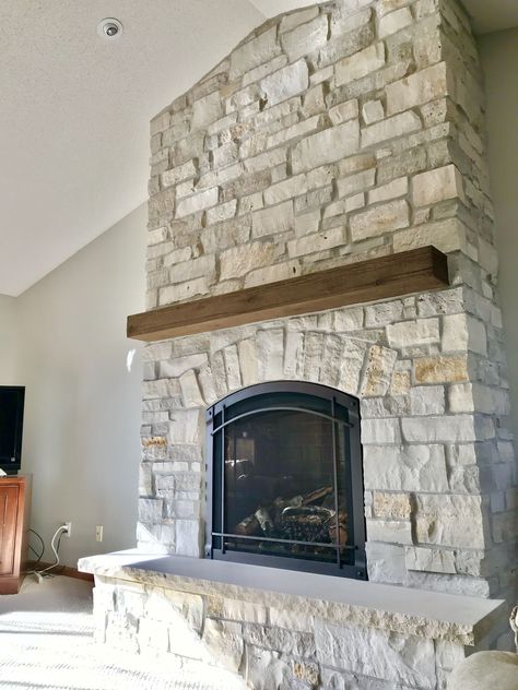 Stone Fireplace Mountain Home, Arch Stone Fireplace, Coastal Stone Fireplace, Farmhouse Rock Fireplace, Rustic Stone Fireplace Ideas, River Rock Fireplace Ideas, Stone Fireplace With Tv Above Mantle, Arched Stone Fireplace, Fireplace Makeover Stone