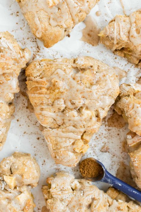 These fluffy, cinnamon-sweet chai spiced apple scones are made with whole wheat and all purpose flour, plain low-fat yogurt, maple syrup, almond milk, a delicious blend of chai spices, crisp apple pieces and a smidge of butter all topped with an apple pie spice glaze. #chaispice #scones #sconerecipe #breakfast #healthyscones #breakfastrecipes #applescones #healthybreakfast #breakfastbakes #sconerecipes Chai Tea Scones, Apple Ginger Scones, Apple Chai Scones, Chai Scones With Maple Glaze, Pumpkin Chai Scones, Healthy Scones, British Scones, English Scones, Apple Scones