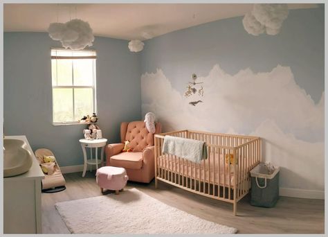 Image 1/1. ~~~Crib: Amazon ~~~Crib Mattress: Amazon ~~~Clouds: Amazon ~~~Bouncer: Amazon ~~~Pig Ottoman: Amazon ~~~Changing Pad: Amazon Blue Gold Nursery, Nursery Ideas Sky Theme, Nursery Clouds Theme, Sky Baby Nursery, Cloud Baby Nursery, Nursery Sky Theme, Sky Nursery Theme, Sky Theme Nursery, Cloud Baby Room