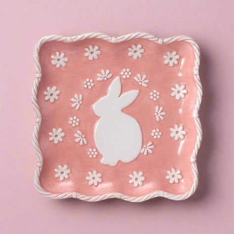 As winter turns to spring, bunnies make their appearance, and this adorable Easter Bunny Rabbit Square Plate will add a seasonal touch to your home. A cute little bunny takes center stage on this stylish and whimsical plate. Perfect stacked on the buffet table where guests can pile it high with tasty morsels or as a salad or dessert plate. Crafted of stoneware. Microwave and dishwasher safe. Easter bunny plate measures 8-1/2 inch square. Whimsical Plates, Easter Bunny Plate, Spring Bunnies, Animal Plates, Modern Easter, Easter Plates, Bunny Plates, Easter Table Settings, Square Plate