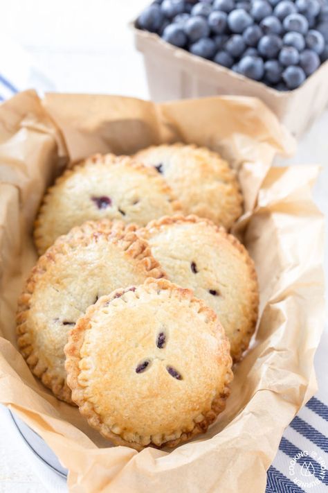 Homemade Blueberry Hand Pies | Cooking on the Front Burner Maine Desserts, Mini Pays, Blueberry Hand Pies, Dinner Party Dishes, Hand Pie Recipes, Impressive Dinner, Party Dishes, Flaky Crust, Hand Pies