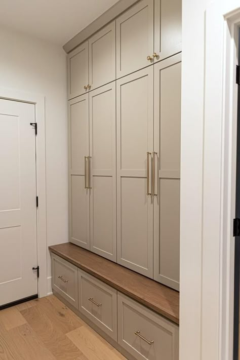 Hall Closet Renovation, Laundry Room With Door To Master Closet, Built In Cabinet Mudroom, Taupe Mudroom Cabinets, Built In Storage Entryway, Mudbench Design, Small Mudroom Cabinet Ideas, Butler Pantry Entrance, Drop Zone With Doors