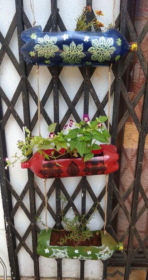 Planter Plastic Bottle, Recycle Bottle Planters, Plastic Bottle Garden Art, Diy Hanging Bottle Planter, Diy Flowers From Plastic Bottles, Diy Plastic Bottles Ideas Recycling, Recycle Plant Pots, Plastic Bottle Hanging Planter, Upcycled Plastic Bottles