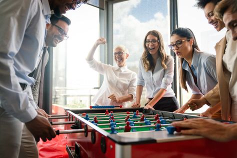 Games For Employees, Office Activities, Business Team, Office Games, Soccer Table, Office Staff, Play Game, Budget Tracker, Styled Stock Photos