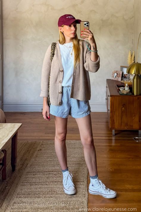 I still love the boxer short trend, these technically are just regular lined cotton shorts but the overall look definitely gives boxer shorts. I paired mine with an oversized white tshirt, a slouchy grandpa cardigan, converse high tops, ruffle socks, and a baseball hat. #eclecticgrandpa #boxershortoutift #easyoutfitideas #runningerrandsoutfits #outfitinspo #tomboyaesthetic • farmers market outfit ideas • how to style boxer shorts • coffee run outfit ideas • easy outfit recipes • Market Outfit Ideas, Ruffle Socks Outfit, Boxer Short Outfits, Short Outfit Ideas, Crew Socks Outfit, Coffee Run Outfit, Striped Shorts Outfit, Outfit Ideas Easy, Boxer Shorts Outfit