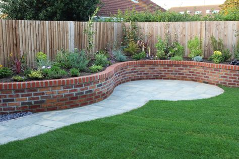 Brick Raised Garden Bed Along Fence, Brick Retaining Wall Garden Bed, Raised Flower Beds Along Fence, Brick Raised Garden Beds, Brick Flower Bed, Small Backyard Garden Design, Plants For Raised Beds, Raised Bed Garden Design, Garden Seating Area