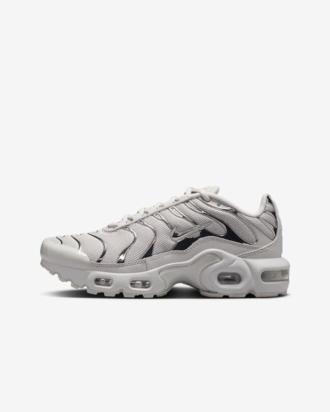 Get a taste of our legendary Tuned Air technology with the Nike Air Max Plus. From the school yard to your backyard, these comfy kicks are ready to play with breathable fabric up top and durable rubber on the bottom. Plus, wavy design lines and iconic plastic accents celebrate bold style. Shown: Light Iron Ore/Gym Red/Smoke Grey/Metallic Silver Style: FZ0977-001 Nike Air Max Plus Outfit, Air Max Plus Outfits, Nike 97s, Nike Tns, Nike Airmax Plus, Celebrity Casual Outfits, Nike Tn, Wavy Design, Iron Ore