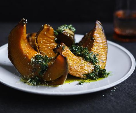 Roasted pumpkin with zhoug recipe - Preheat oven grill to high. Place pumpkin wedges skin-side down on an oven tray lined with baking paper, drizzle with oil and toss to coat, then grill, turning occasionally, until golden, softened and slightly charred (20-22 minutes). Zhoug Recipe, Starchy Sides, Vegetarian Christmas Recipes, Oven Tray, Pumpkin Salad, Vegetarian Christmas, Pumpkin Dishes, Pumpkin Soup Recipe, Roasted Pumpkin